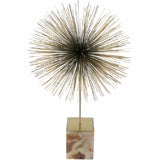 C. Jere sculpture with marble base