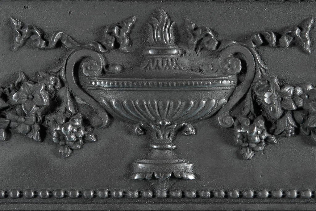 Victorian style cast iron fireplace surround from England. <br />
<br />
Opening Dimensions:  38