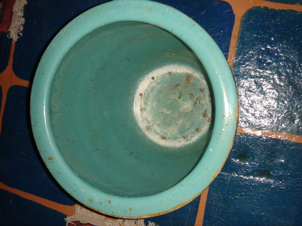 Pottery Jardeniere glazed with turquiose inside.  Outside brown glaze with gold glaze dragon design surrounds with gold glaze, Would have been used to store eggs, use for a side table or planter now.