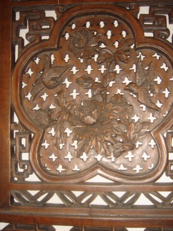 Pair of Chinese hand carved wooden placques with two different designs great detail and having old brass hangers at top