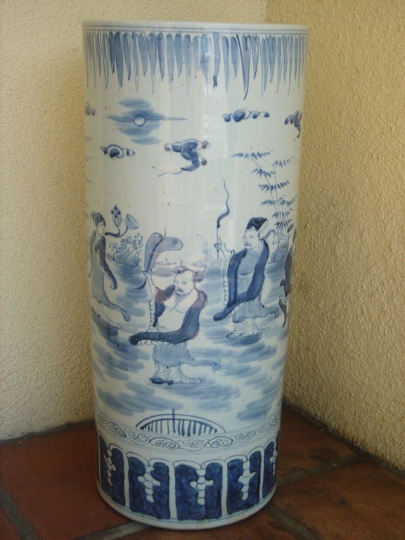 Blue and white umbrella containers, originally used to hold coal to warm the room.