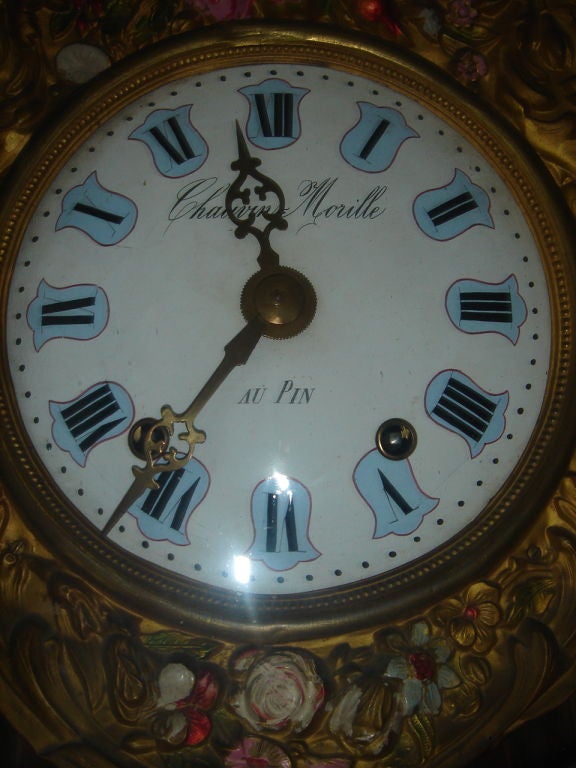 This is the best clock and condition I have ever seen. Enamel faced wedding tall case clock signed Chauvin Morille, au Pin (city in France)  hand painted flowers to the front and inside the penglum is hand painted flowers and pussy willows adorn    
