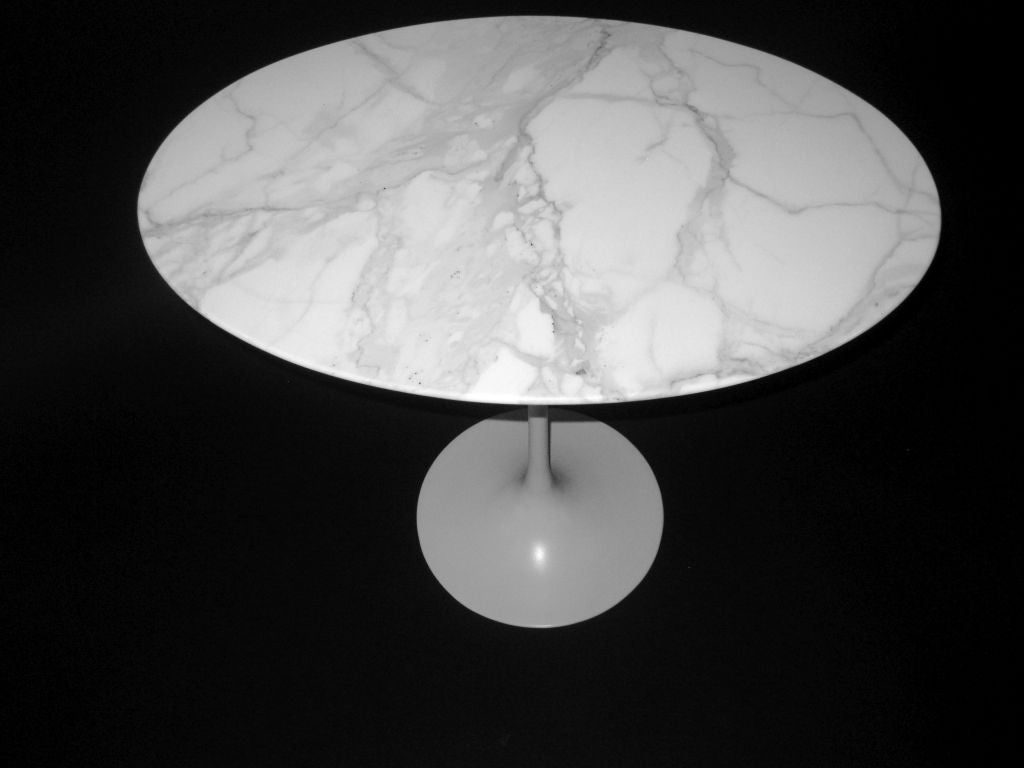American OVAL SIDE TABLE W/CALACATTA MARBLE TOP-BY E. SAARINEN