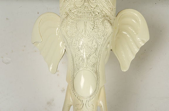 Carved wood elephant deminlune table