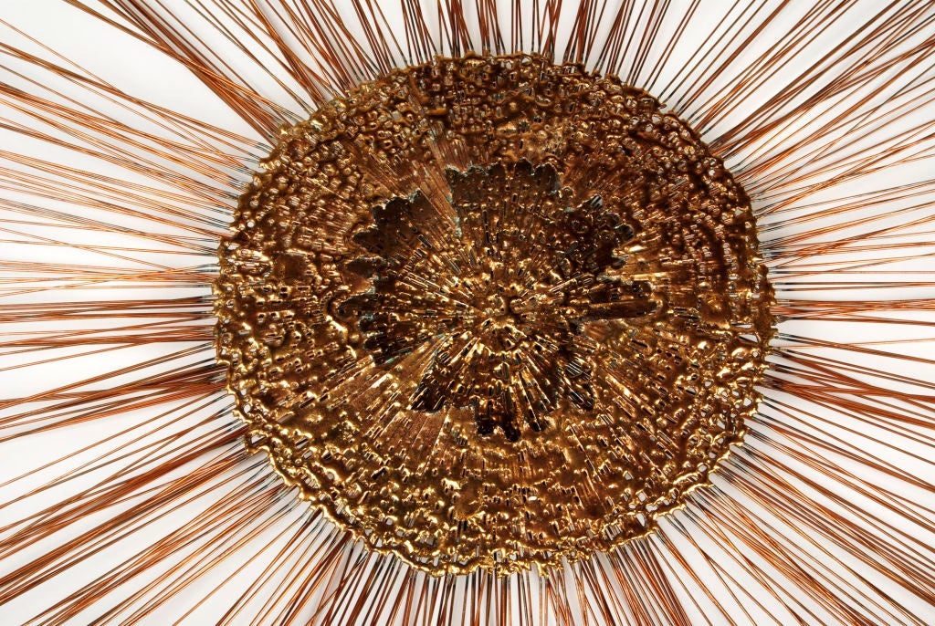 Metal wall sculpture in the manner of C. Jere