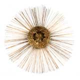 Metal wall sculpture in the manner of C. Jere