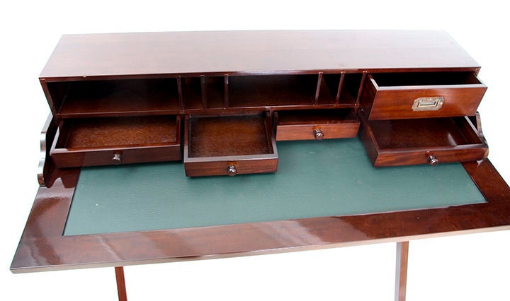 Safari inspired portable writing table with leather top.