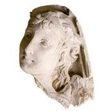French plaster fragment of female face.