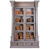 Gorgeous pale grey wooden bookcase with columns