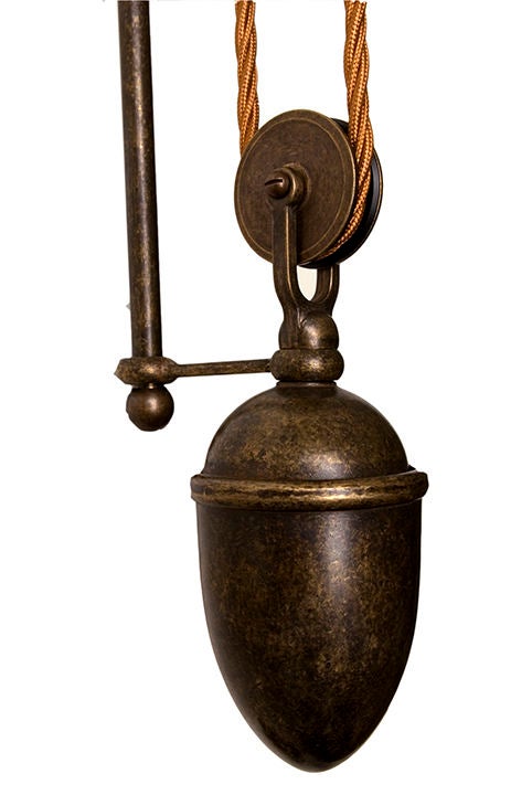 Very chic French counter balance wall light with a brown-bronze finish