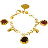 18k Sliced Tourmaline Charm Bracelet with 22k Antique Charm