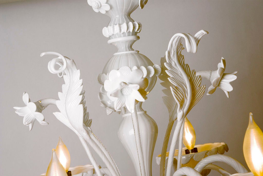 Beautiful Venetian style Murano glass chandlier in white glass. Absolutely stunning. This chandelier can be ordered in many different colors and sizes...<br />
<br />
Holds six 40 watt bulbs.
