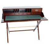 Safari inspired portable writing table with leather top.
