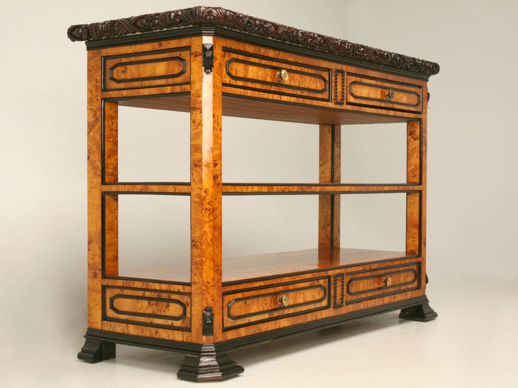 Gorgeous Louis Philippe server made from bird's-eye maple with ebonized trim, restored the old fashioned way, with layers upon layers of hand applied French polish. Magnificent carved edging and corner accents. A beautiful example of old world
