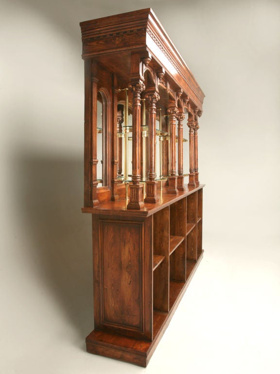Handmade in Europe of solid woods with no MDF or particle board utilized. Beautifully distressed and finished in an antique cherry color. Breaks down for ease of moving. Lower portion could be enclosed with doors, wine racks, or retrofitted with a