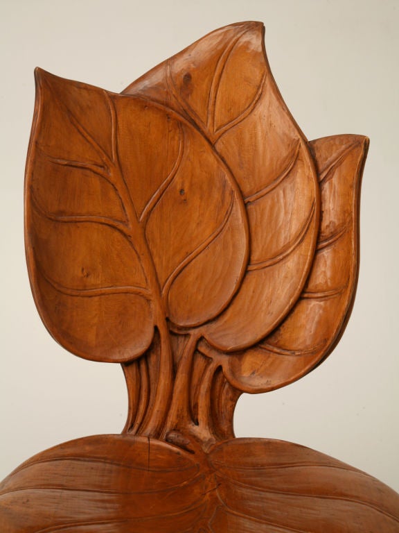 Unusual Hand-carved Art Nouveau sculptural chair from the Mountain Region of France. It appears to be made from fruitwood but we are not positive.
