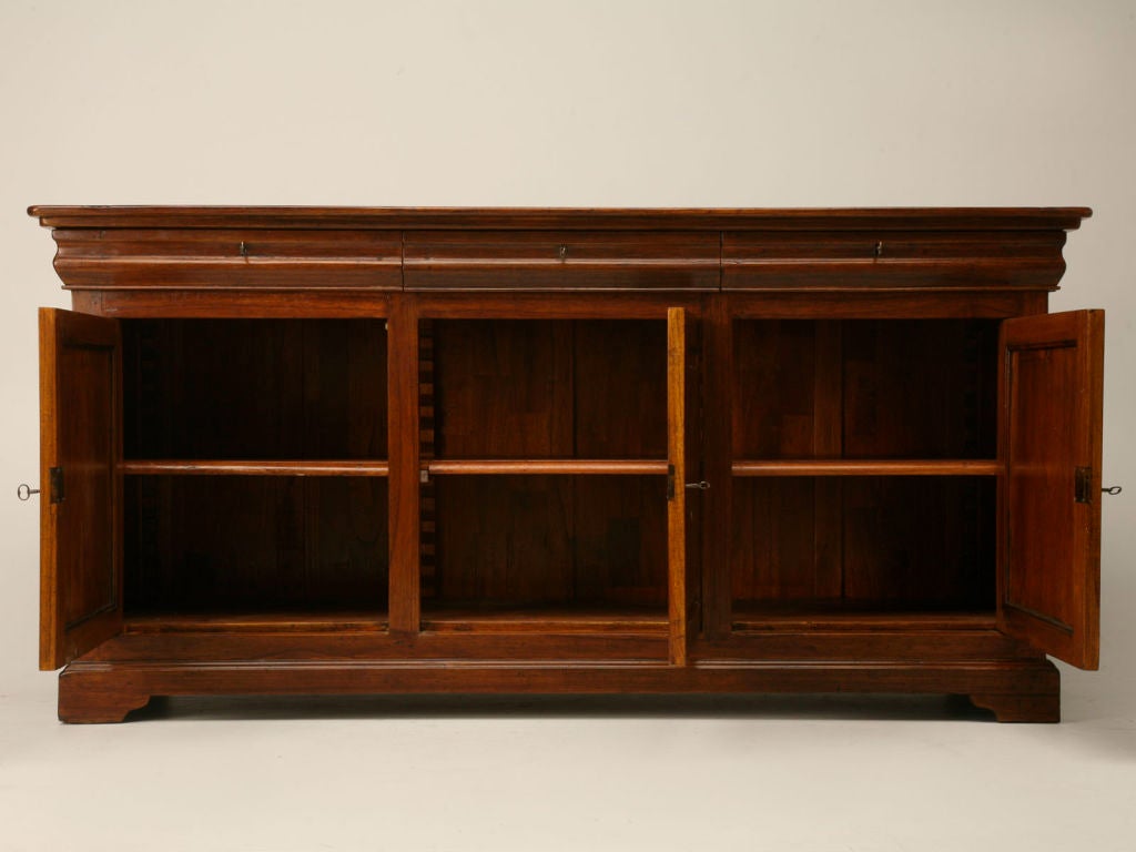 Reproduction Louis Philippe style 3 over 3 buffet made from reclaimed teak wood with adjustable shelves. Antique style construction using wooden pegs.