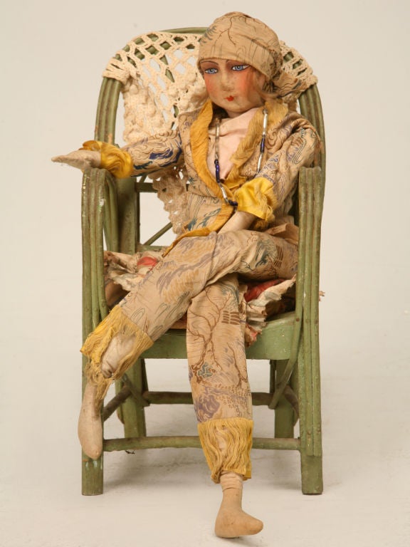 French Art Deco glamour doll in original clothes with painted bent willow chair. She looks as though she's waiting for her martini. Ooh-la-la!

The measurements below are for the doll. The chair is 15