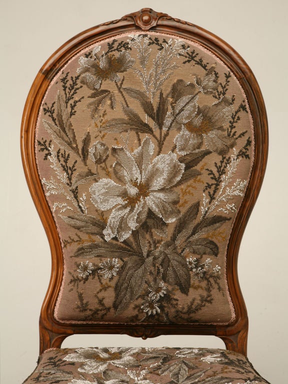 From our store owner's private collection-- Exquisite handmade antique English, Renaissance Revival lady's slipper chair with incredible hand beadwork and a gorgeous rosewood frame. Rare and unusual lilac field color, makes this chair a very special