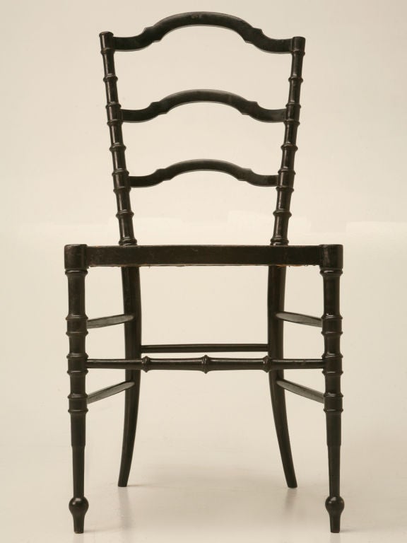 Great petite French Napoleon III ebonized sidechair, with  decorative details and caned seat.