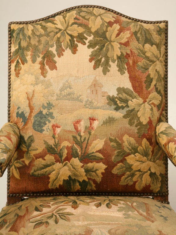 Exquisite pair of antique (18th C.) French Louis XV throne chairs with their original Aubusson tapestry upholstery- not to be mistaken for needlepoint. The scenes alone transport one back to a much calmer, simpler way of life. Frames are made from