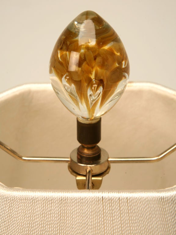 Gorgeous, vintage paperweight lamp attributed to St. Clair with the original matching finial, great colors and a beautiful cut glass base. This fine lamp is stunning when lit. Quite simply, fantastic.<br />
<br />
* The diameter below is for the