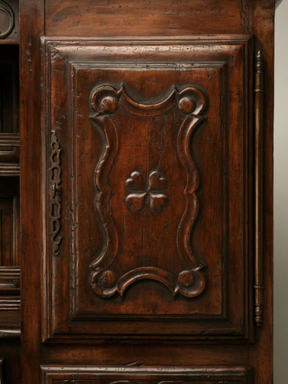 Outstanding large scale hand-carved Spanish oak buffet/cupboard with unique hutch topper. The mere scale of this piece is incredible, as well as the awesome details and distressing that gives it a totally 18th century appearance. Tons of storage