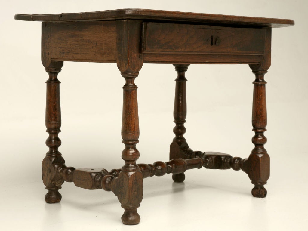 Magnificent rustic French oak 2-board top, farmhouse table with a hand-dovetailed drawer that still retains it's original lock. A great scale as either an end table or as a tea table, this gorgeous table would be at home most anywhere.