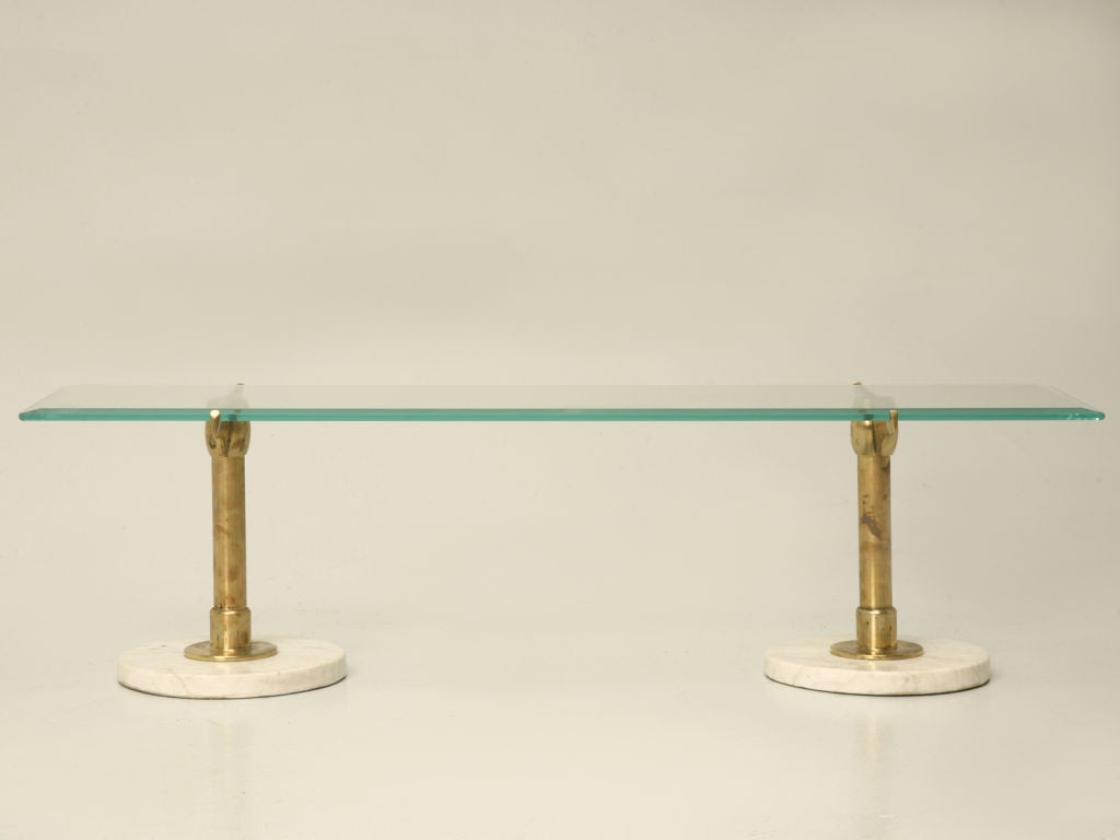 A fantastic pair of hard to find, French brass and marble pastry stands, shown with a piece of beveled glass. These beauties could be used a number of places, decorating a mantle, buffet, island, or gracing the center of one's grand dining table,
