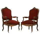 Exquisite Pair of Heavily Carved Antique French Louis XV Walnut Fauteuils
