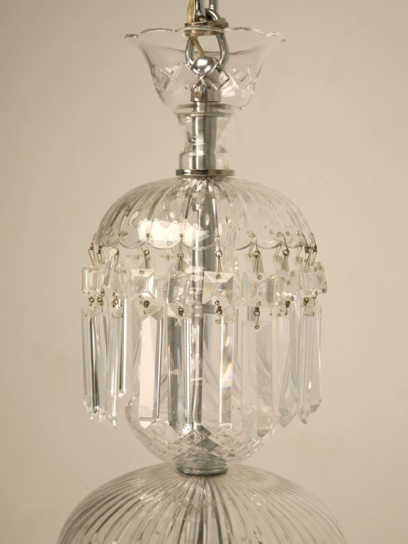 Gorgeous vintage hand-cut crystal 9-light chandelier. Absolutely stunning. The party we bought it from said it is Waterford, though we are not experts, and cannot guarantee it, it does resemble the high-quality crystal, as well as a pattern