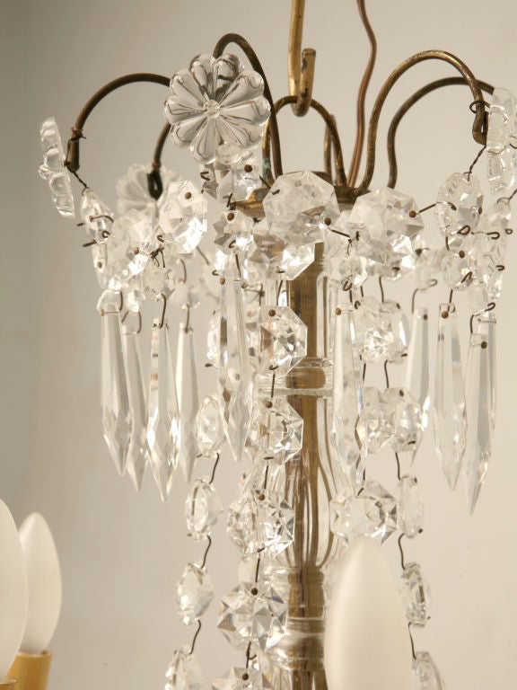 Petite vintage French bronze 6-light crystal chandelier. When your room needs that little extra OOMPH, the petite size of this chandelier makes it the perfect size for a bedroom or a bath.