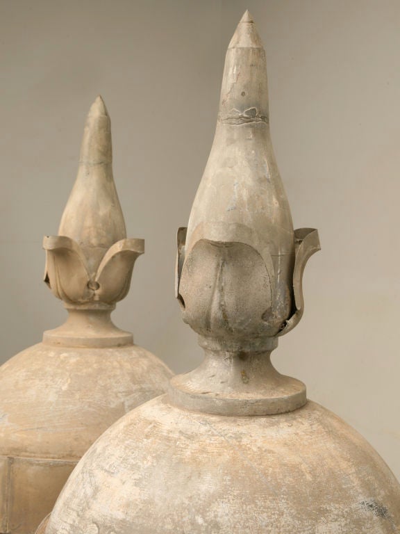 Pair of large antique French zinc architectural roof-top sphere-form finials. In the 18th century, zinc became a popular roofing material in Belgium and France. Throughout the 18th and 19th centuries, zinc was also molded into other architectural