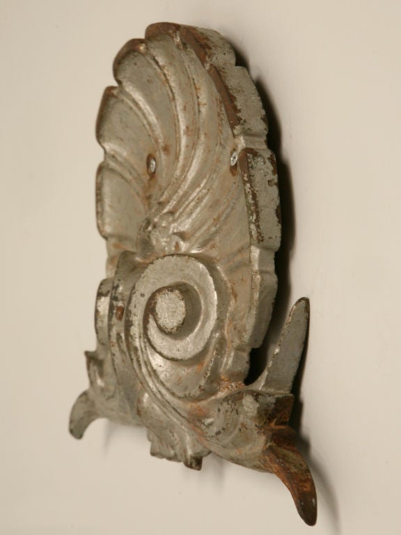 Original cast iron shell form decoration from an antique French Butcher's block.