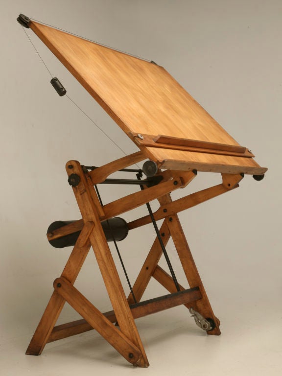 Unique fabulous looking vintage French fully articulated drafting table. This remarkable table easily changes from one position to another, making drafting, sketching or drawing an absolute breeze. We have seen photos in design magazines,