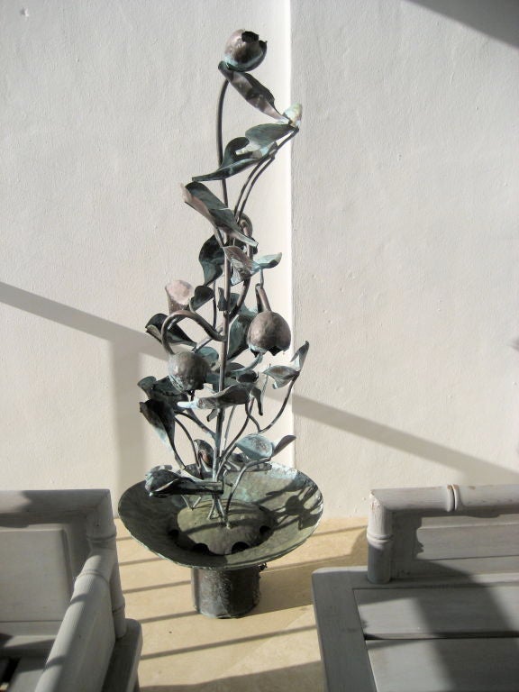 Wonderful bronze undulating vine and pod fountain handmade by Michigan artist Jim Millar of Charlevoix.  This vintage fountain has a blue and green patina. Each leaf is designed to allow water to drip from leaf to leaf all the way to the bottom
