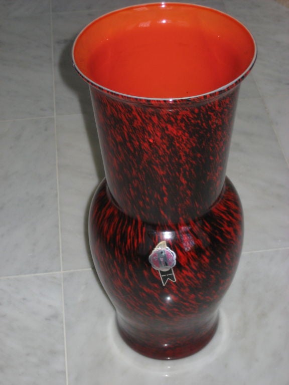 Red and black Murano glass vase attributed to Seguso with original label.
