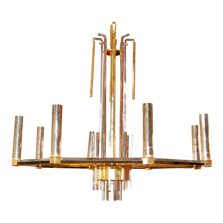 1970s eight lights brass and metal Italian chandelier by Sciolari.