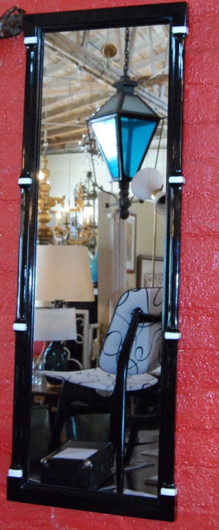 PAIR OF 1960'S HOLLYWOOD REGENCY BLACK AND WHITE LACQUER FINISH MIRRORS.