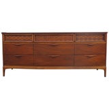 A Lattice Front Nine Drawer Walnut Dresser After Edward Wormley