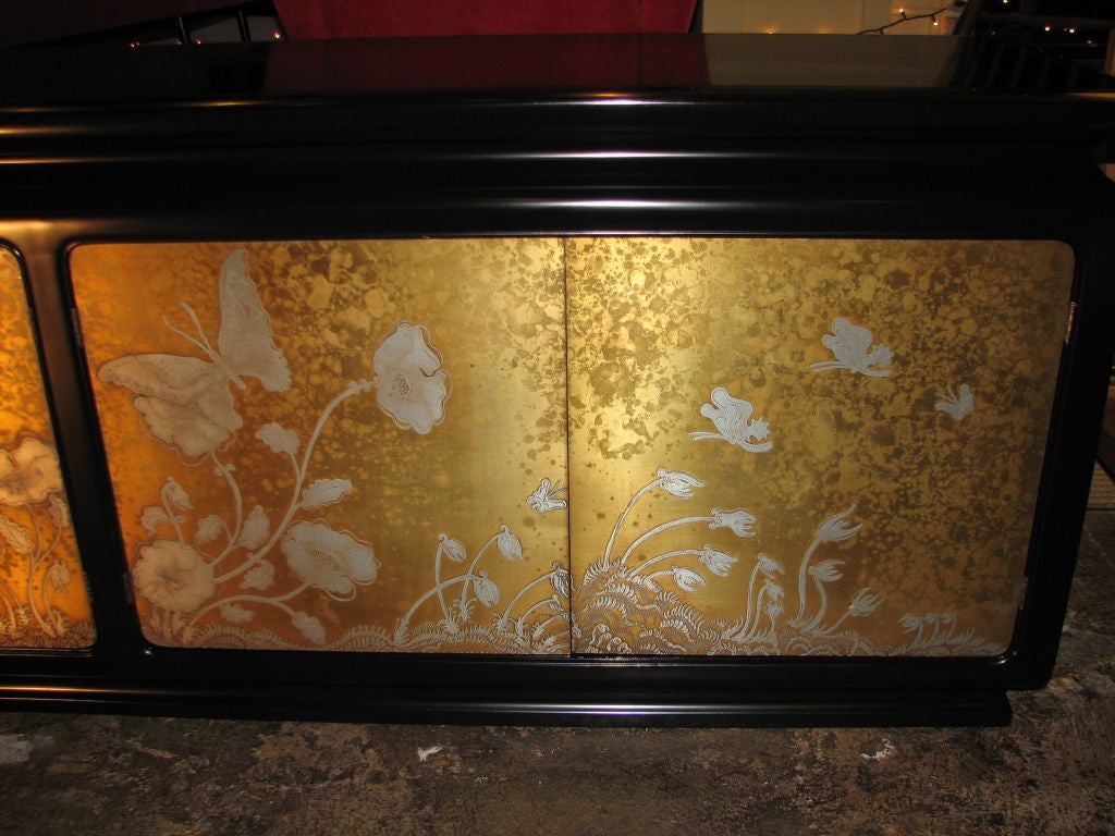 Black lacquer body with silver butterflies and flowers inserted in oxidized gold background.<br />
Beautiful quality and design! <br />
The back is finished too so it can be used like a room divider.