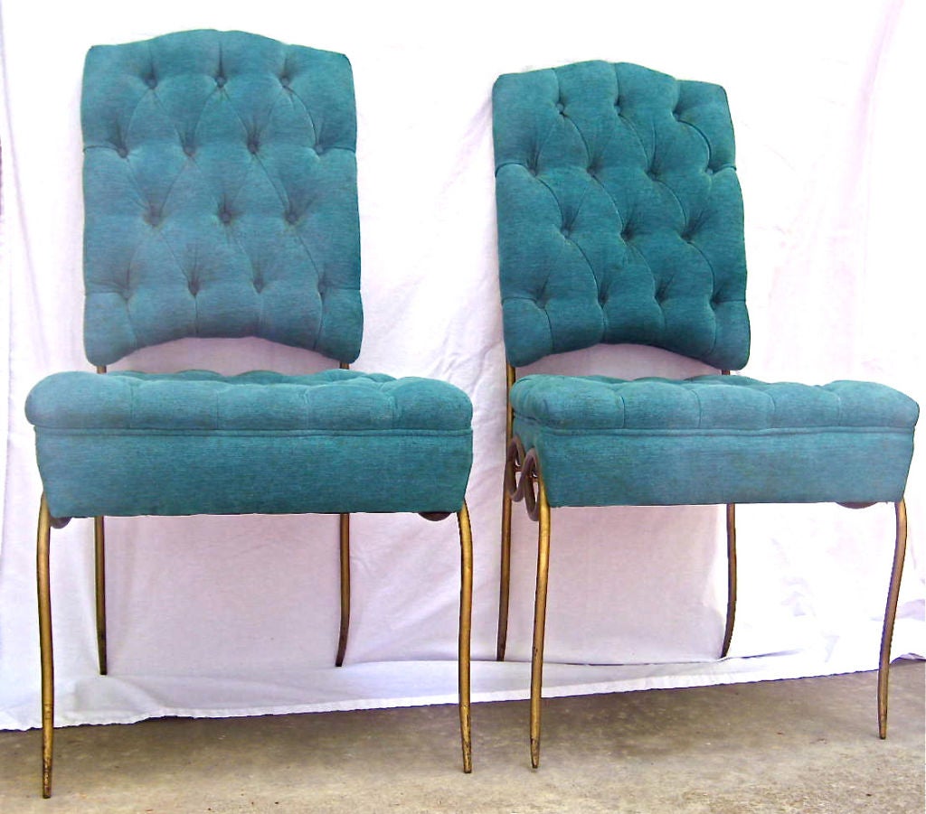 Pair of Rene Drouet Serpent chairs with original button tufted upholstery.