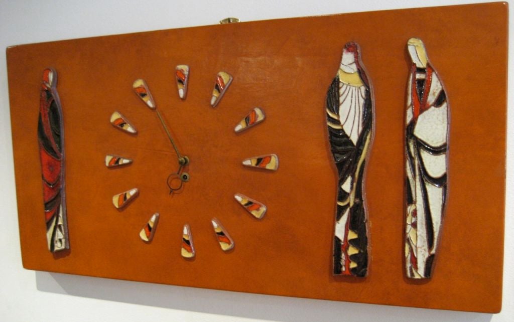 Wood Harris Strong Leather Clad Clock with glazed Earthenware Figures