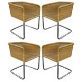 Set of four tubular chrome and wicker chairs by Harvey Probber