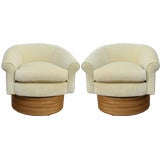 Exqusite pair of swivel Club chairs with Zebrawood bases