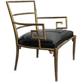 Italian brass armchair with Greek key armrests