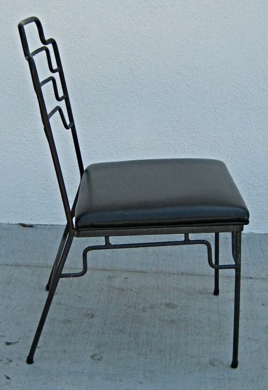 Set of four Iron dining chairs