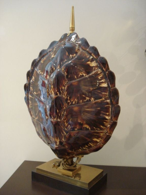 Incredible tortoise shell lamp by Maison Jansen mounted on a brass base.