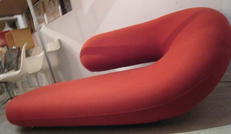 SCULPTED FOAM UPHOLSTERED IN RED WITH CASTERS