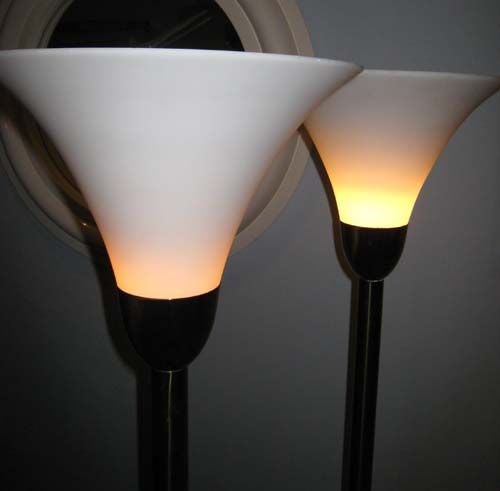 ELEGANT PAIR OF BRASS AND WHITE GLASS TORCHIERES